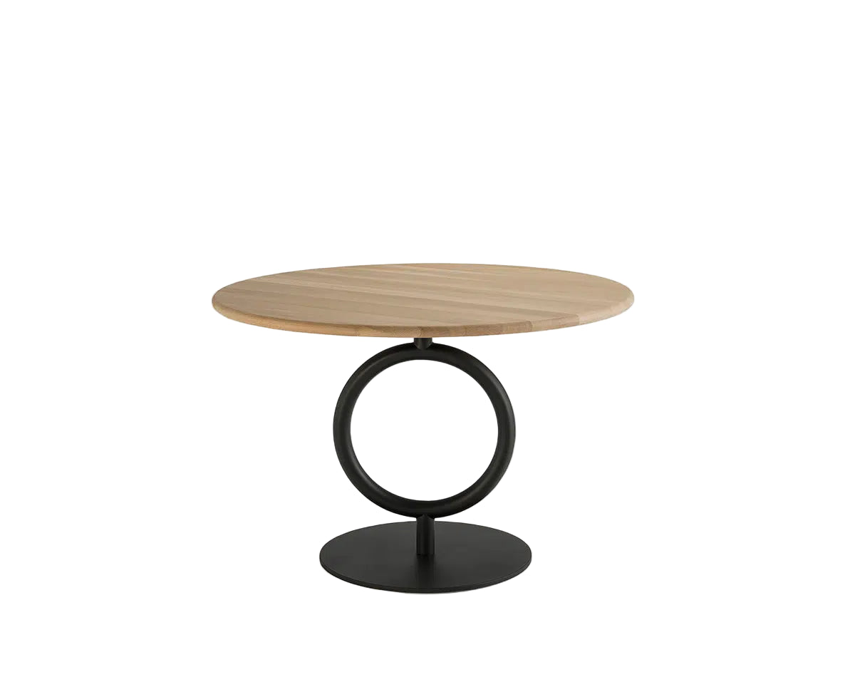 Round wooden table with a black circular base on a white background