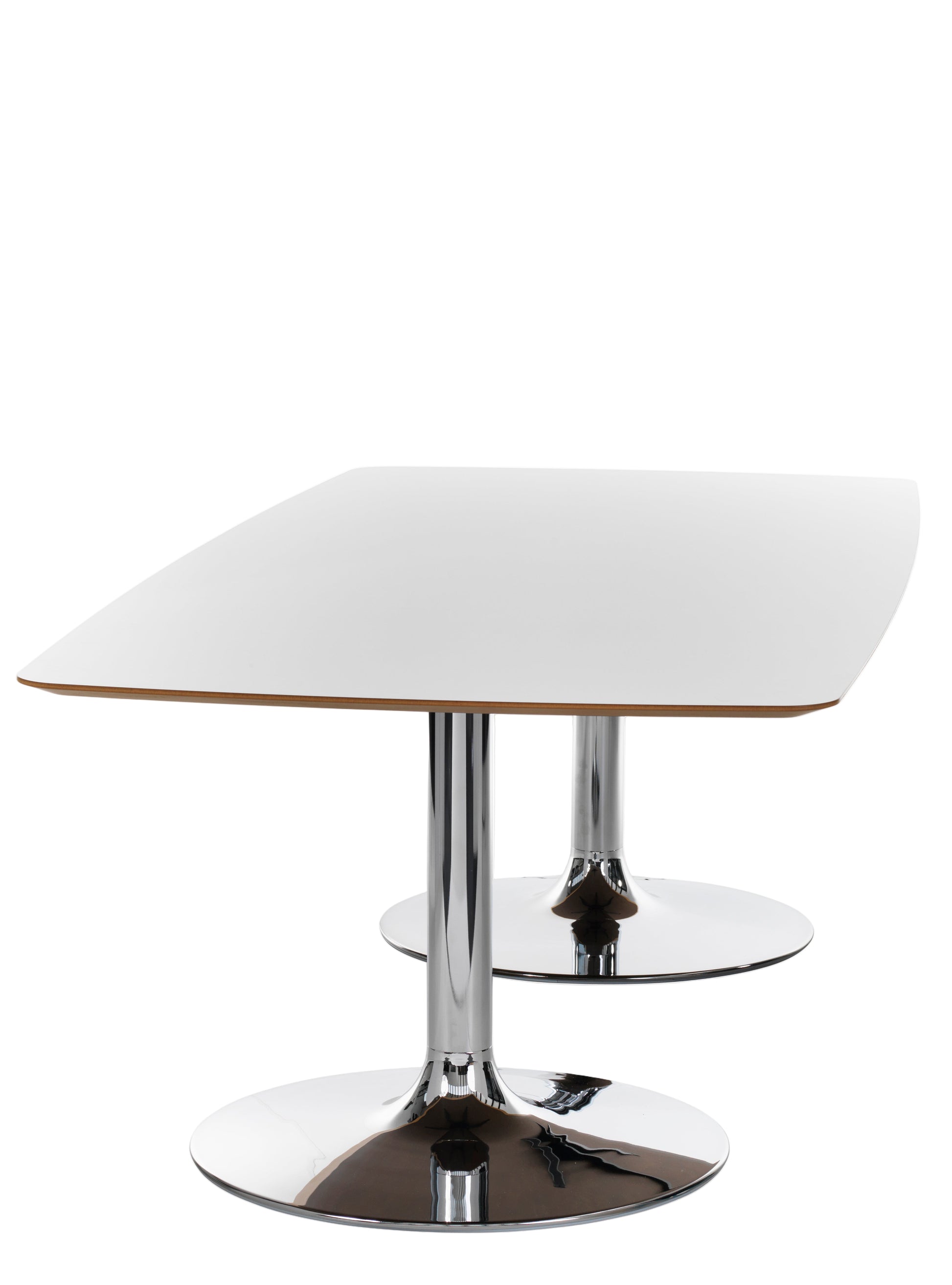 Modern side table with white top and chrome base on a white background